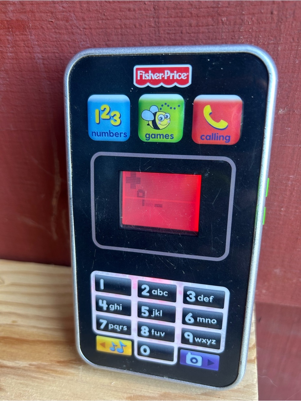 Fisher-Price Black Toy Phone with Blue Screen and Multicolor Buttons